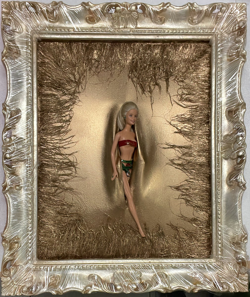 Barbie piume dorate