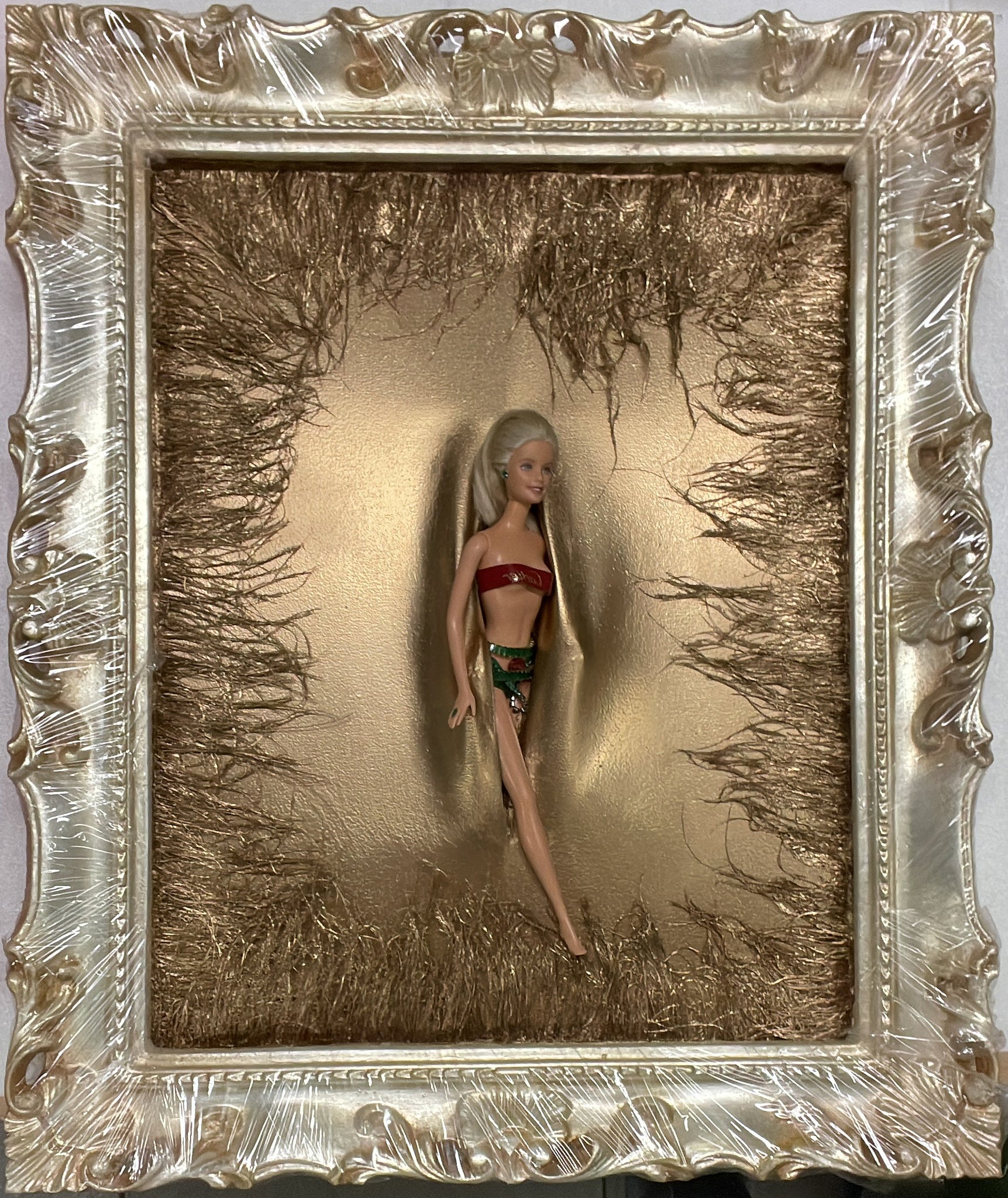 Barbie piume dorate