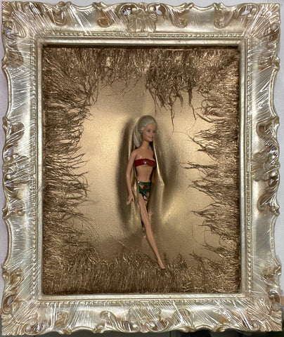 Barbie piume dorate