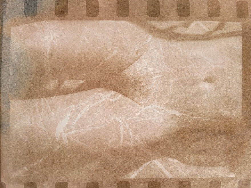 Lady Relaxing - Nude sunbather on Porquerolles beach - Michael Joseph