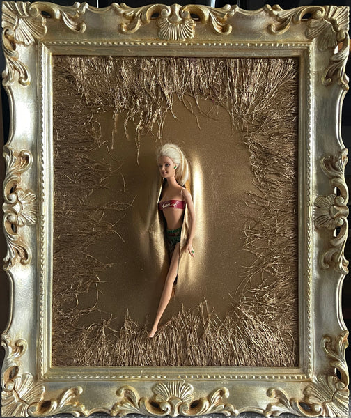 Barbie piume dorate